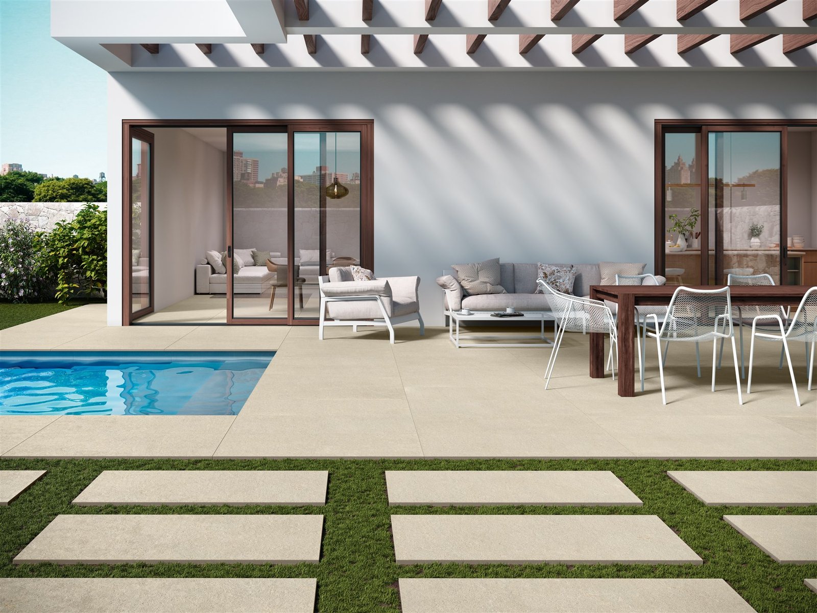 Terrasse et plage de piscine en carrelage effet pierre